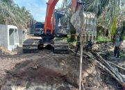 Melalui program TMMD ke – 124, Kodim 0320 Dumai Menyelesaikan Salah Satu Sarana Bangunan Fisik di Kelurahan Bukit Kayu Kapur