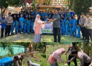 Program Green Policing Polsek Medang Kampai Gelar Penanaman Pohon di SMPN 8 Dumai