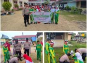 Edukasi Siswa Siswi Polsek Dumai Timur Dengan  Menanam Pohon di SDN 017